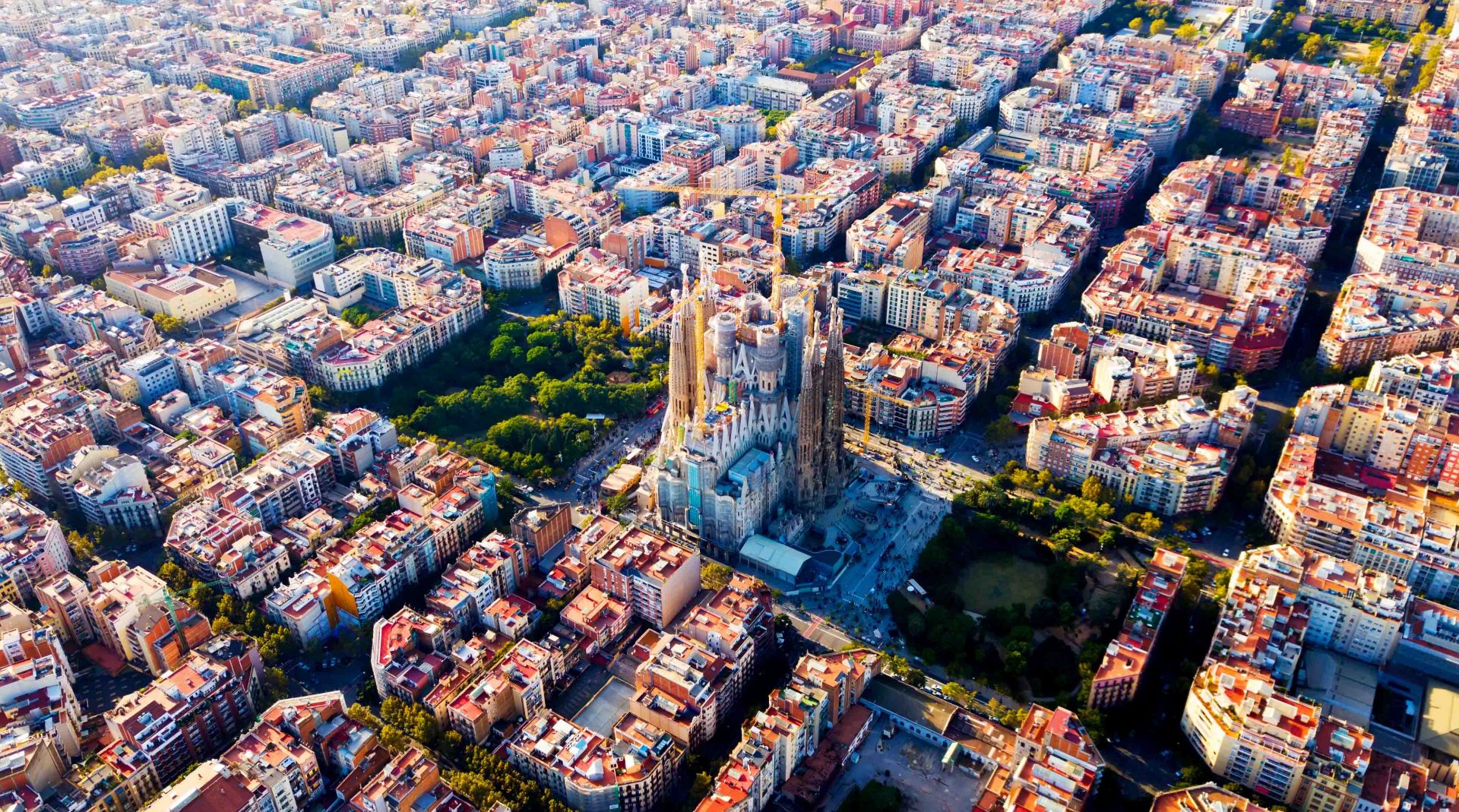 Aerial view of cityscape of Barcelona, Eixample district and Sagrada Familia